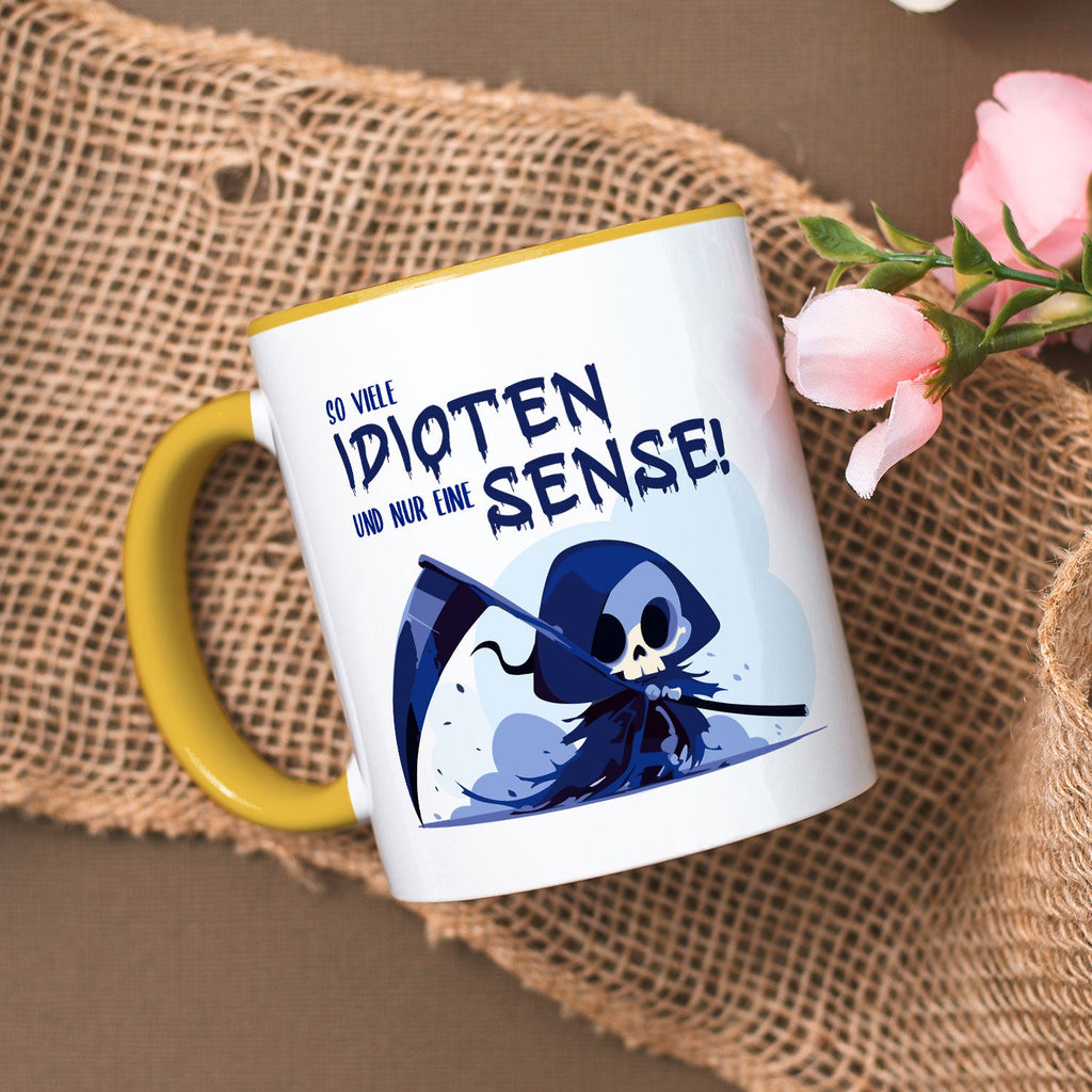 Bedruckte Tasse mit Spruch in blau - So viele Idioten und nur eine Sense