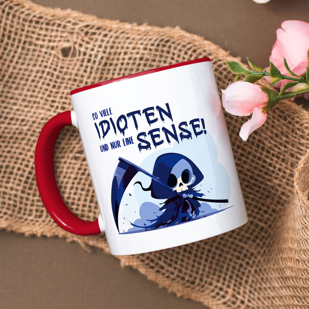 Bedruckte Tasse mit Spruch in blau - So viele Idioten und nur eine Sense