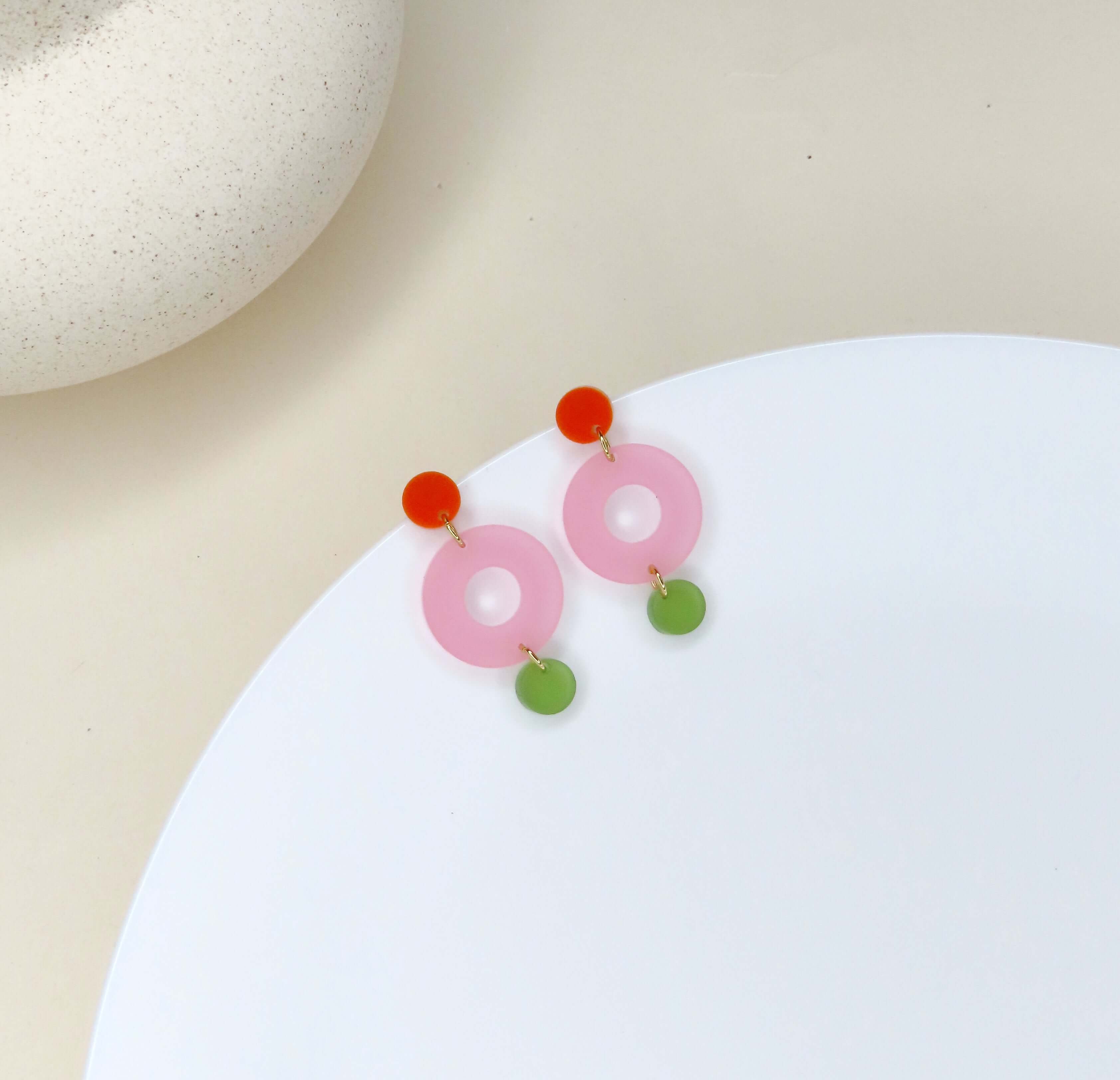 Colorblock Double Circle Ohrstecker in orange, eisrosa und olive transparent