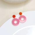 Colorblock Circle Ohrstecker in orange & rosa