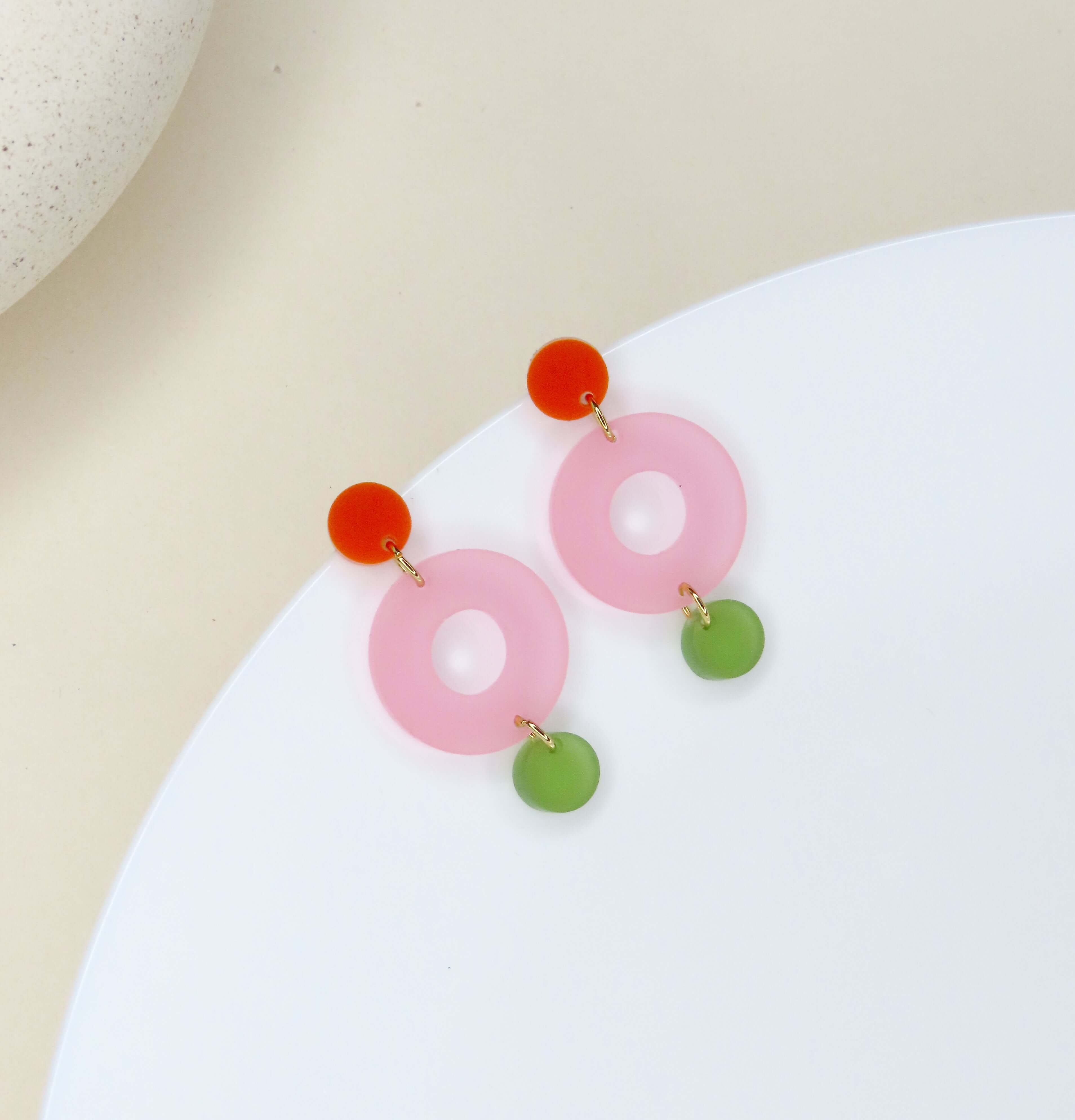 Colorblock Double Circle Ohrstecker in orange, eisrosa und olive transparent
