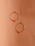 Orange Neon Perle an goldener Edelstahl Creole